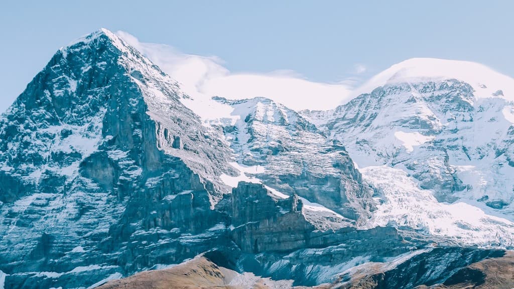 Mountain landscape behind product architecture